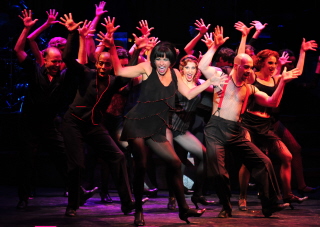 Rachelle Rak and the cast of Chicago